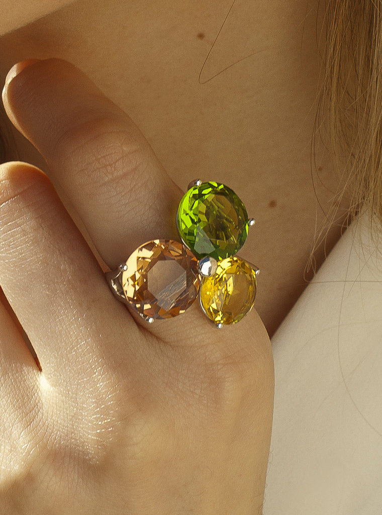 Silver ring with three stones in earth tones