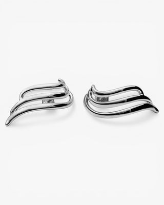 Pendientes originales en plata con un diseño fluido