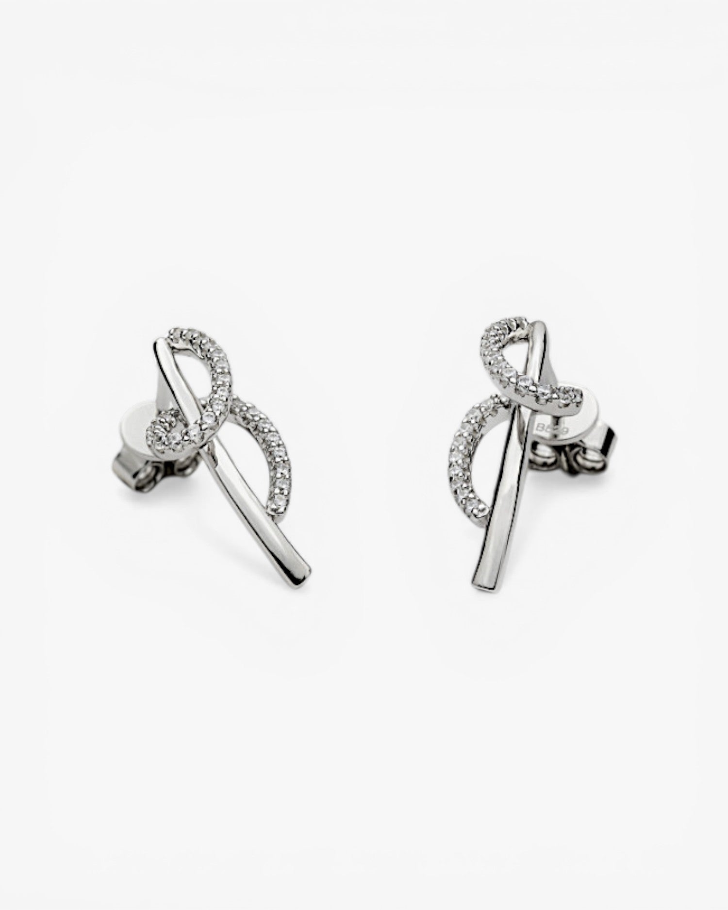 Small silver earrings with a tangled design