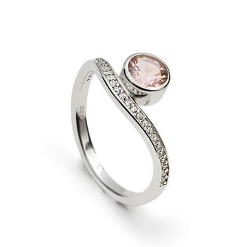 Silver ring with cubic zirconia and pink stone