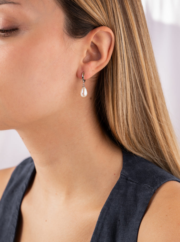 Silver hoop earrings with dangling pearl