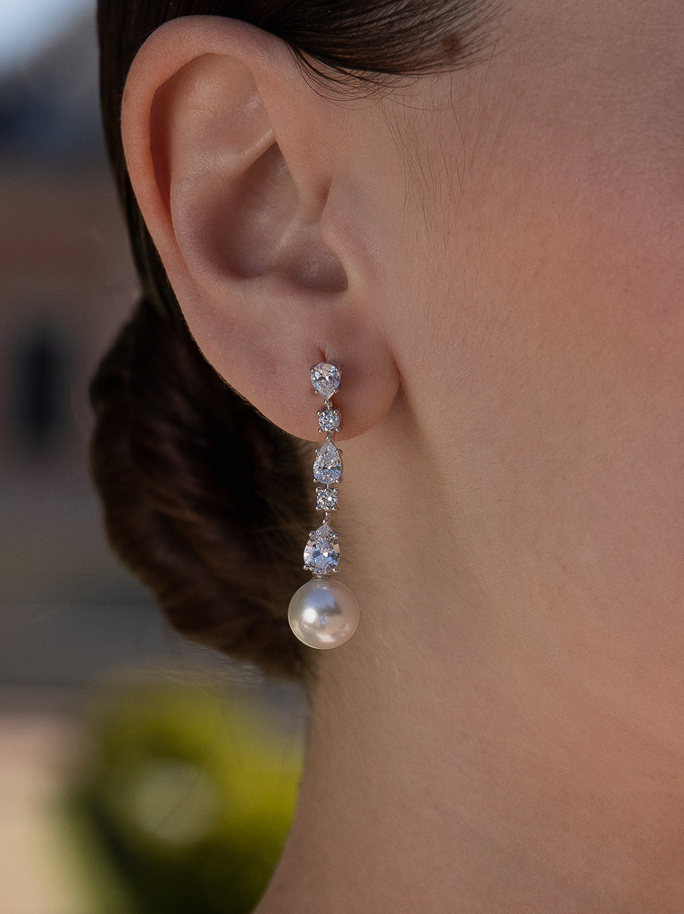Silver pearl earring with cubic zirconia, long design