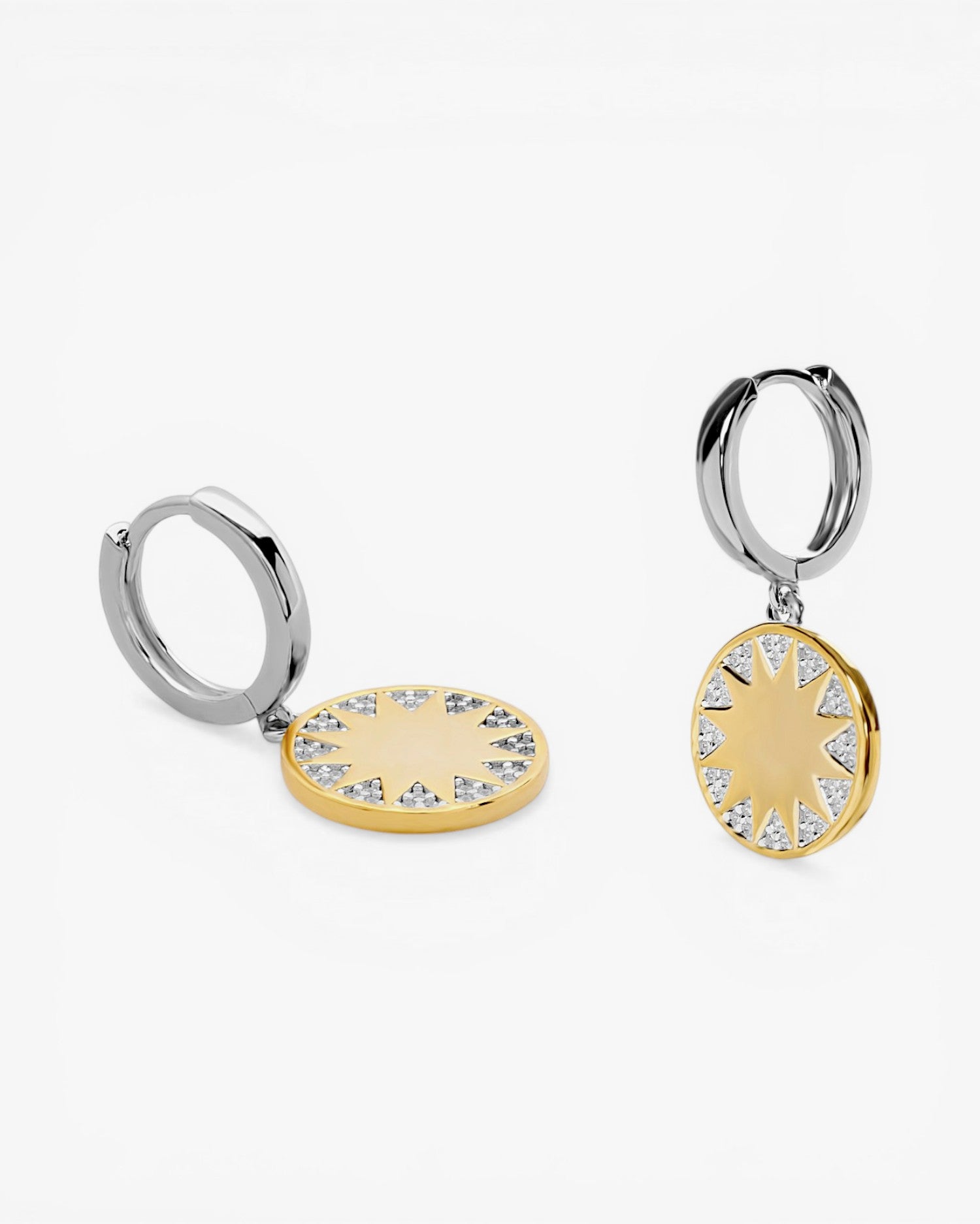 Pendientes bicolor aro con colgante diseño solar con circonita