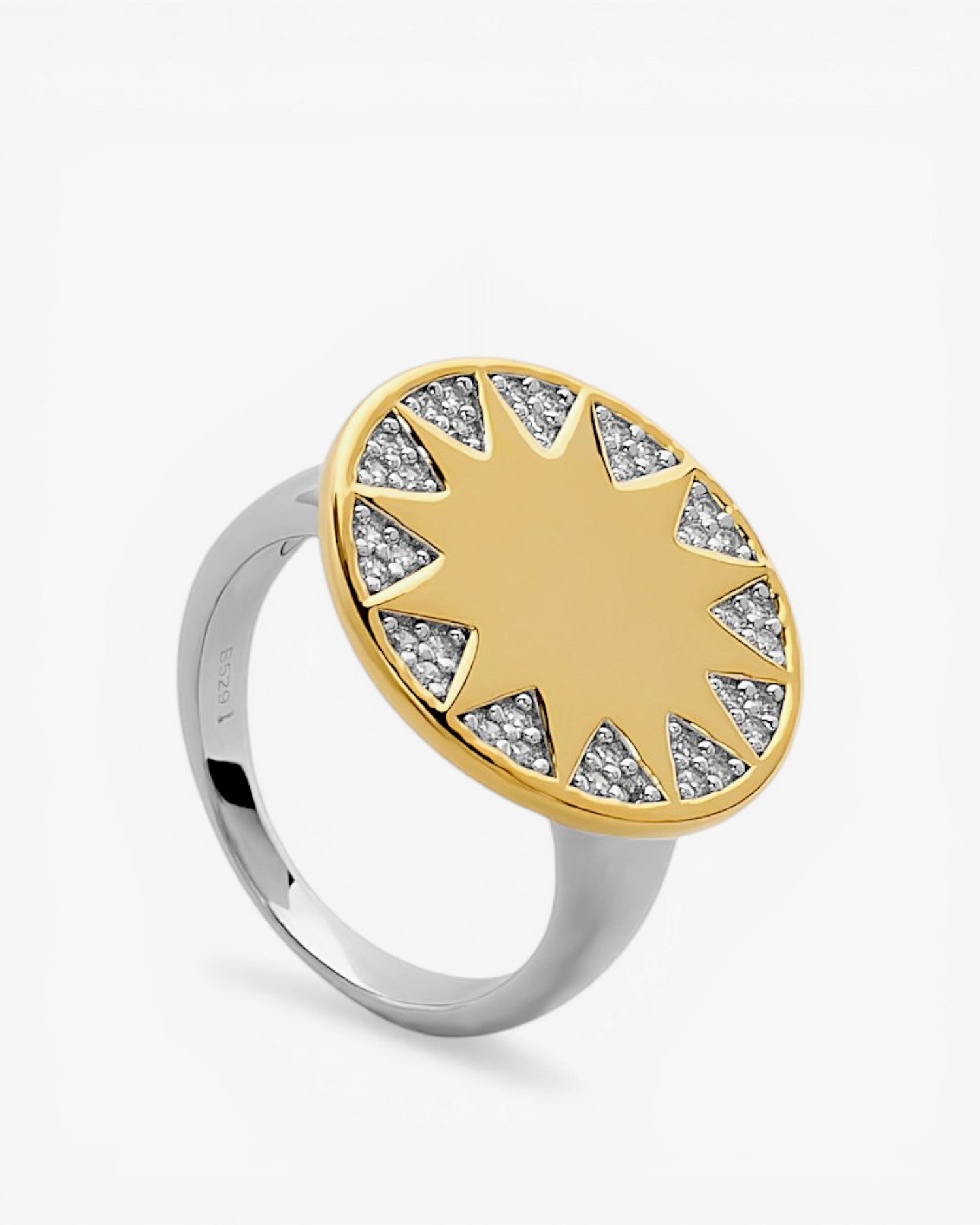 Anillo bicolor aro con colgante diseño solar con circonita