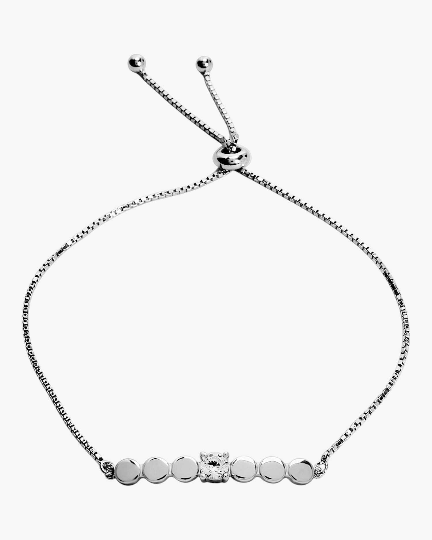 Pulsera fina de plata con piezas circulares y circonita central