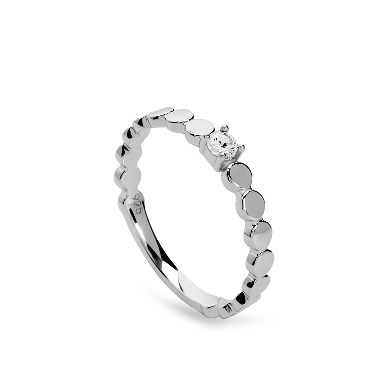 Anillo fino de plata con piezas circulares y circonita central