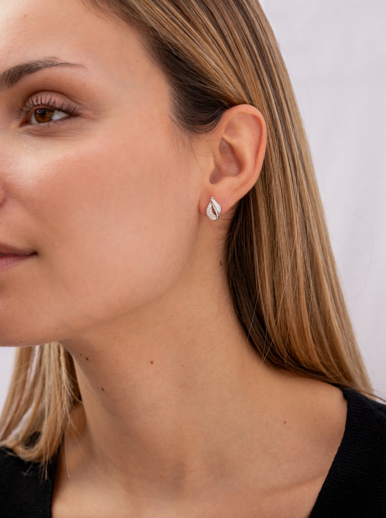 Small silver earrings with linked cubic zirconia