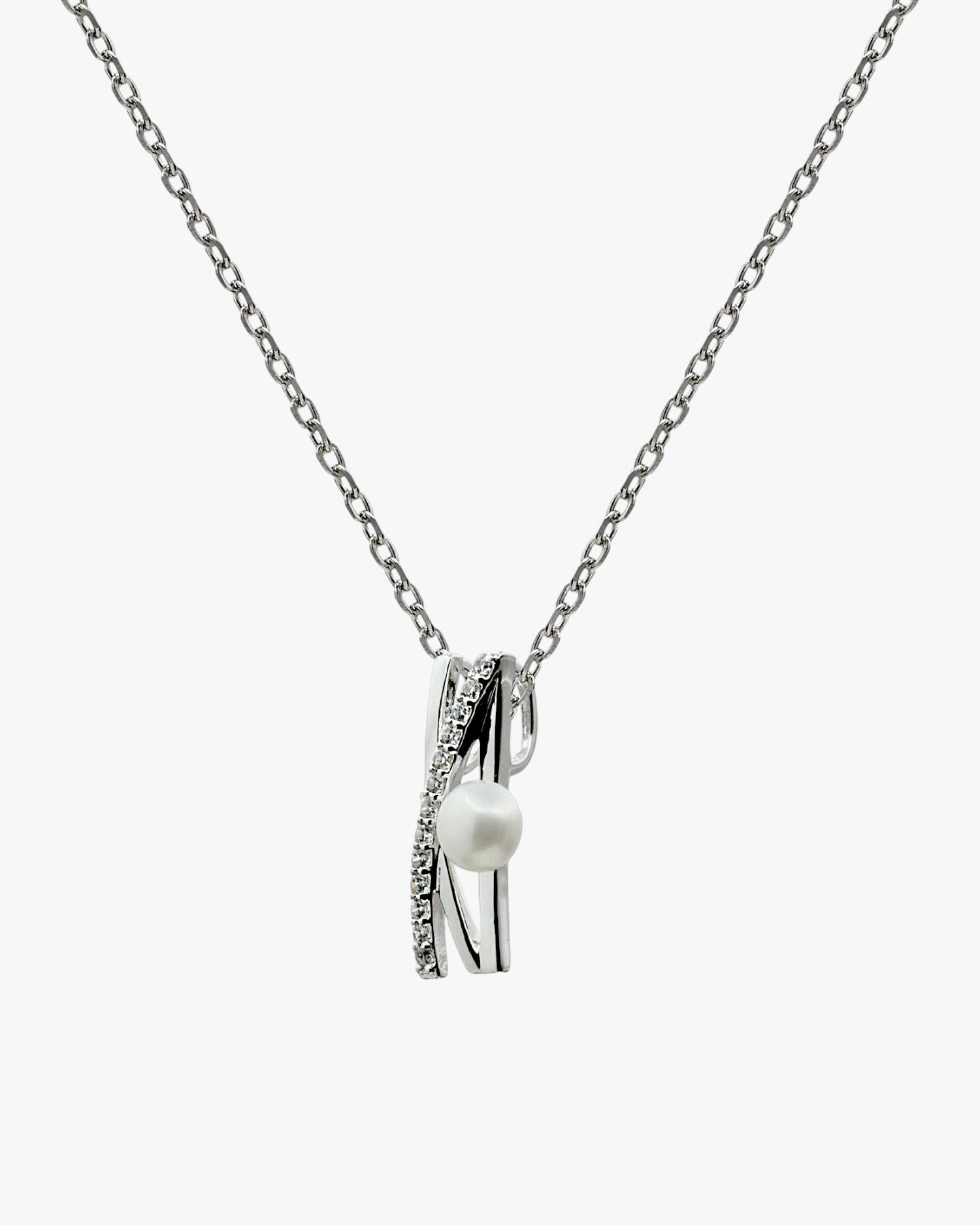 Collar de plata cruzado con circonita y perla