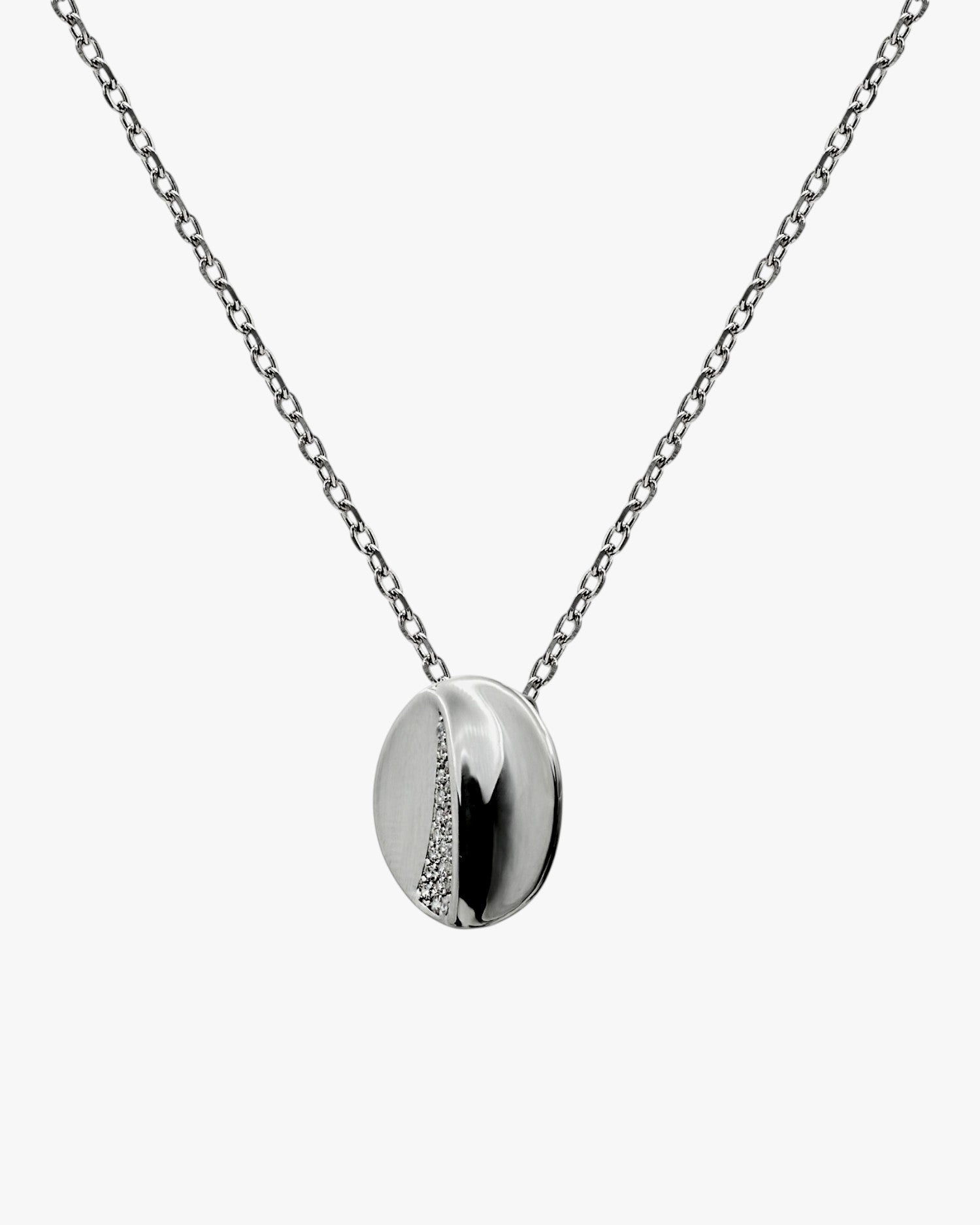 Small circular silver necklace with volume and cubic zirconia