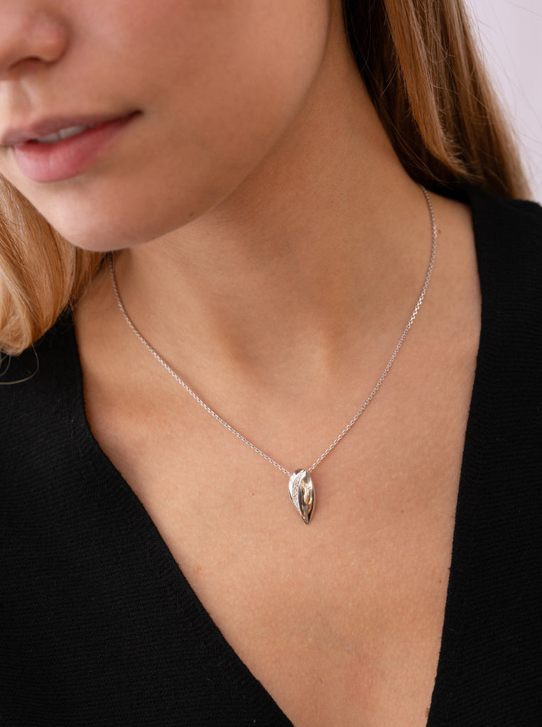 Small silver necklaces with cubic zirconia abstract design