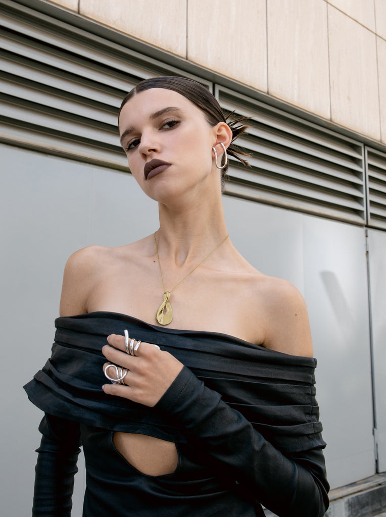 Collares plata originales con diseño asimétrico dorado