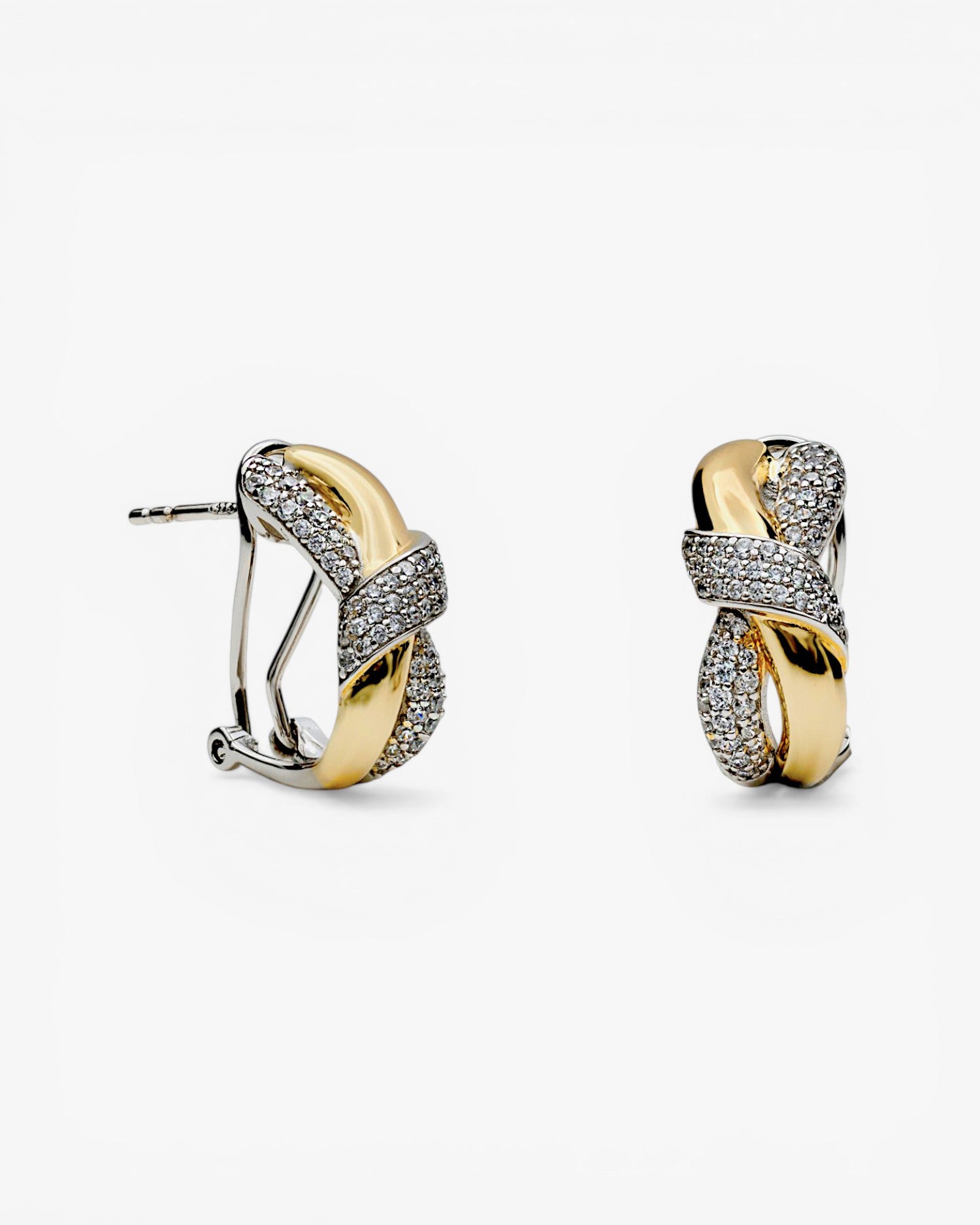 Two-tone earrings linked with a knot and cubic zirconia