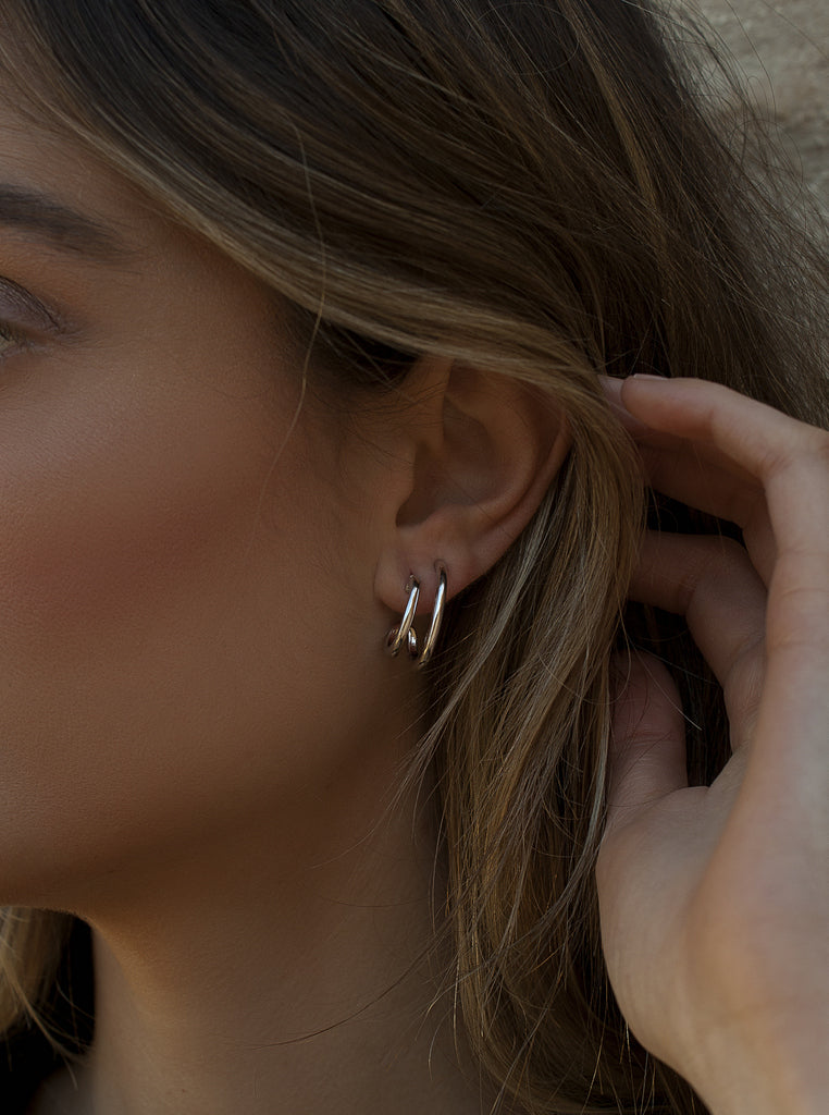 Silver earrings with double hoop design