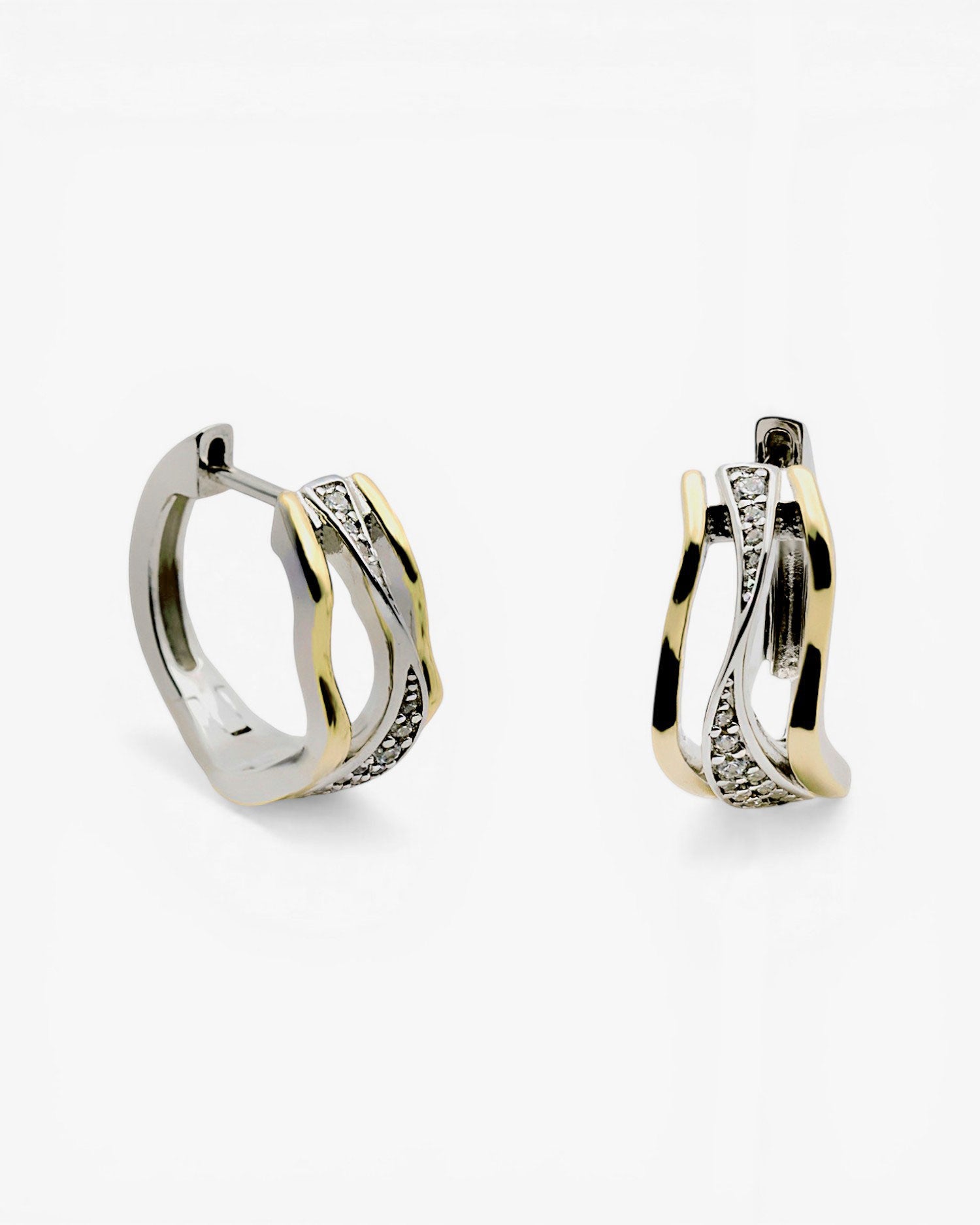 Two-tone silver hoop earrings with cubic zirconia cross design