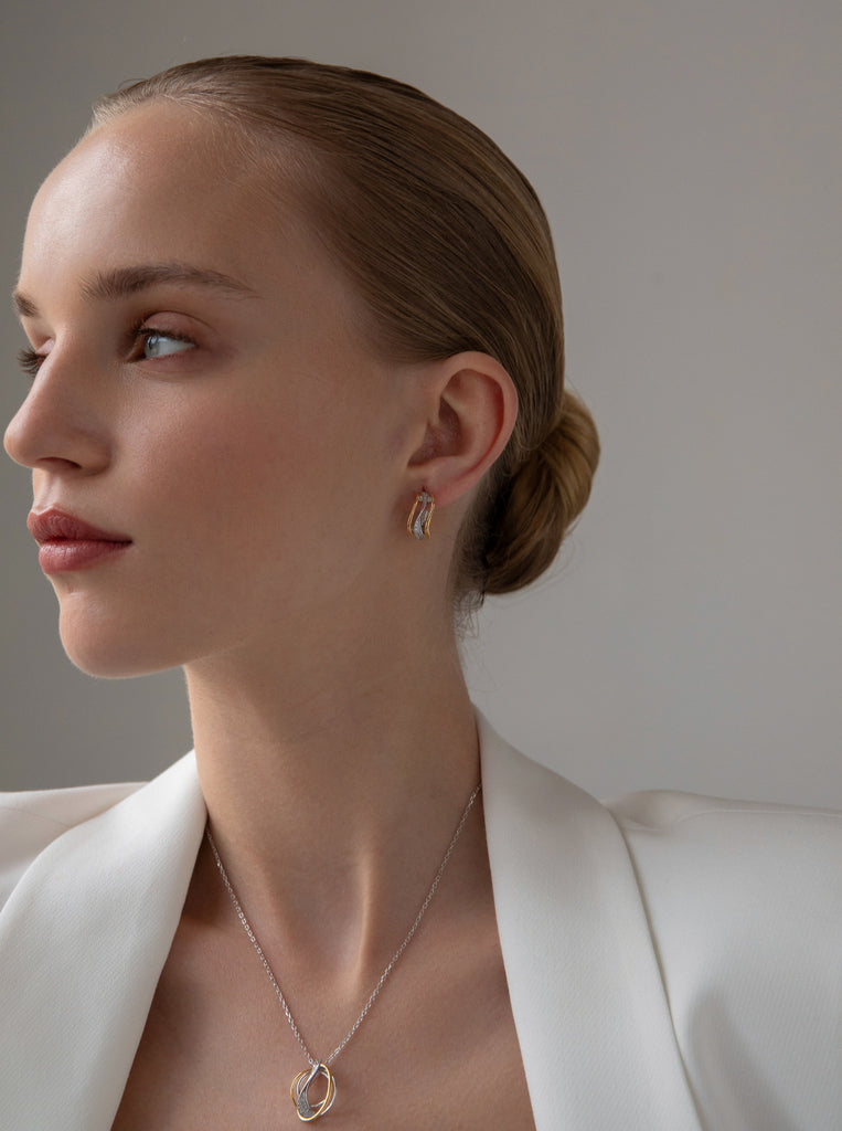 Pendientes aro plata bicolor con circonitas diseño cruzado