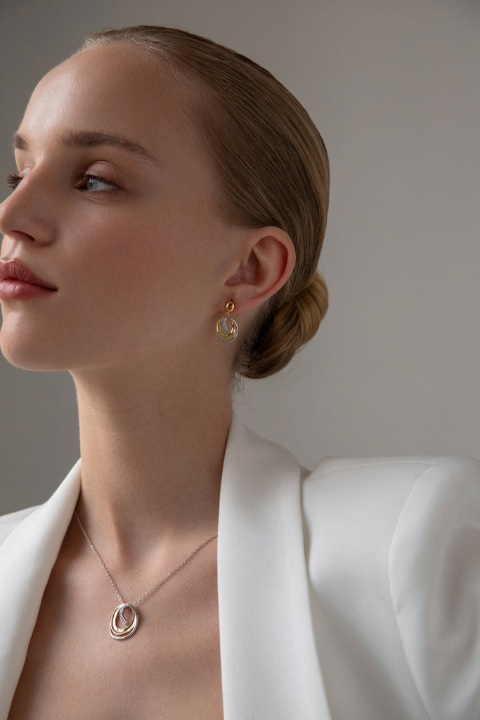 Two-tone silver dangle earrings with cubic zirconia