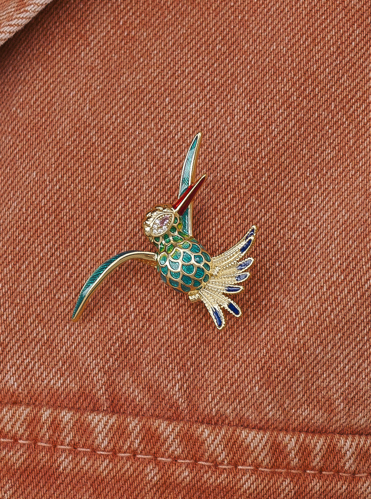 Broche con circonitas y esmalte en forma de pajaro
