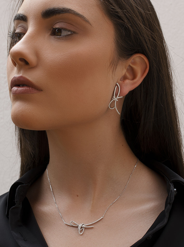 Pendientes de plata con circonitas en forma de lazada