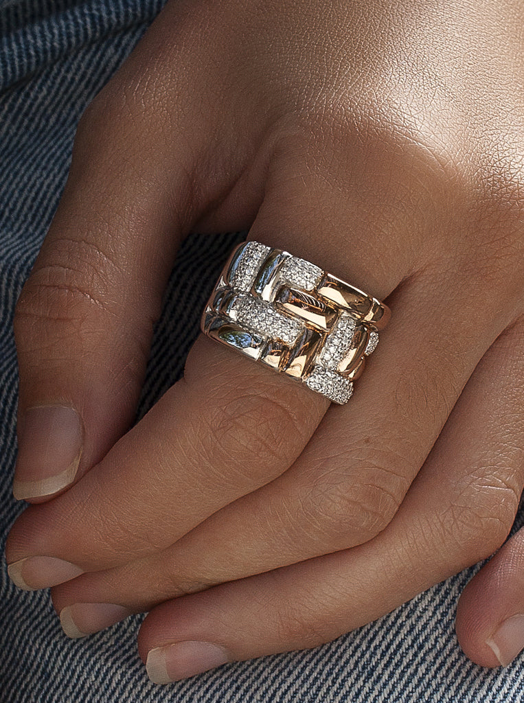 Anillo bicolor de plata estilo tejido con circonitas