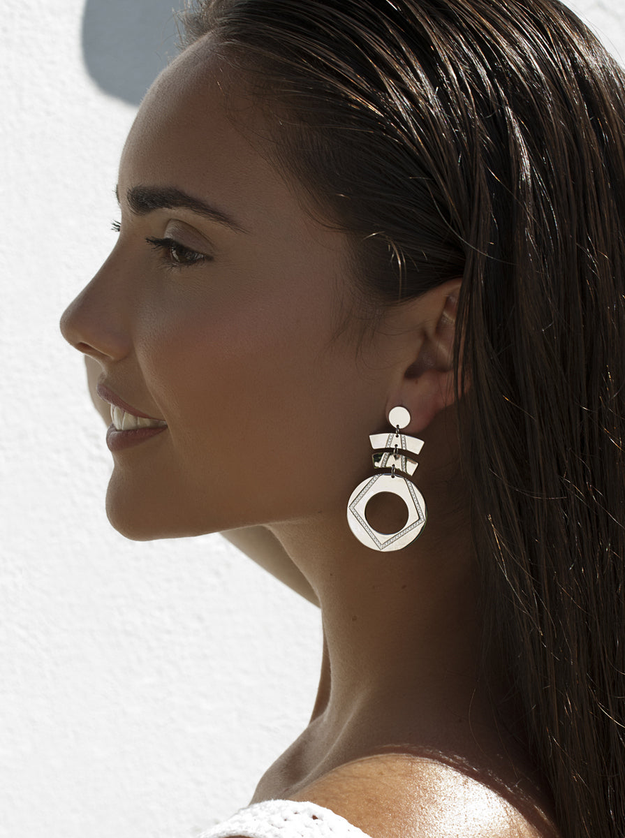 Pendientes largos de plata con circonitas diseño geometrico