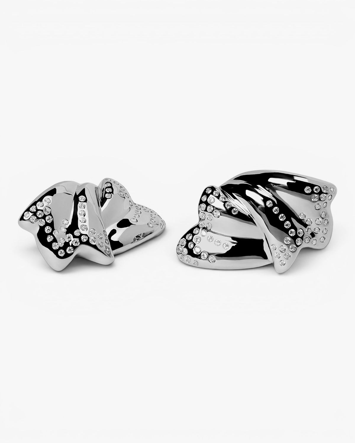 Sculptural silver earrings with cubic zirconia