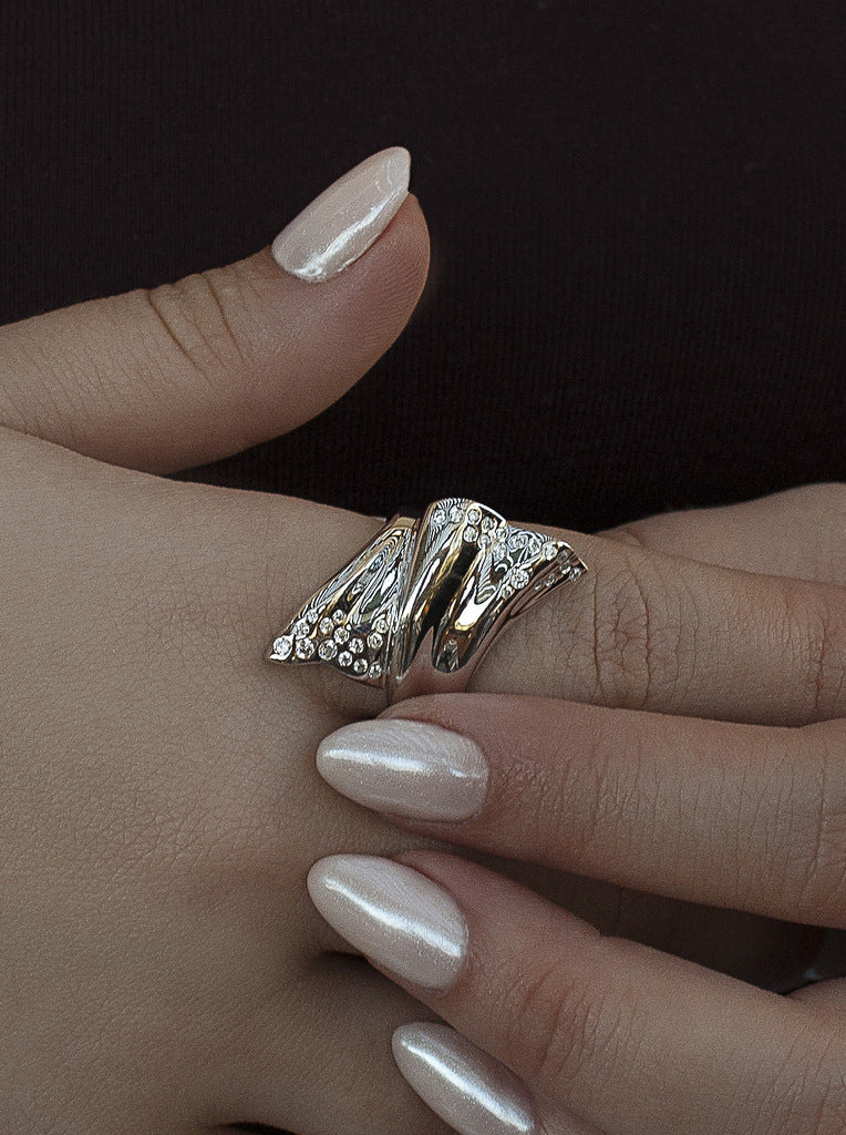 Sculptural silver ring with cubic zirconia