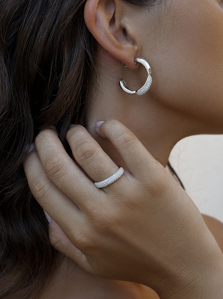 Silver hoop earrings with puffy effect cubic zirconia