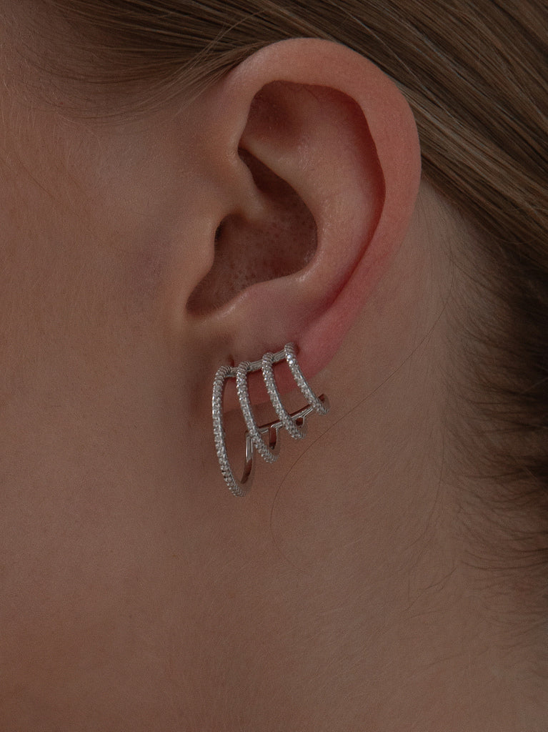 Pendientes originales de plata estilo trepadores diseño moderno