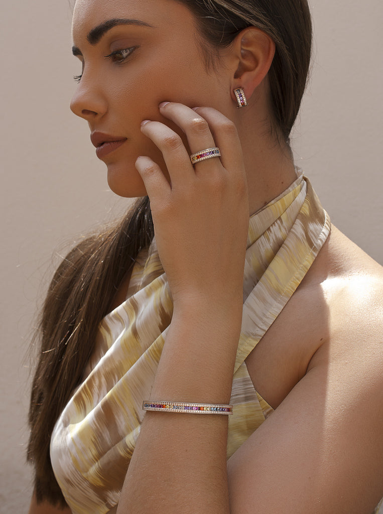 Silver hoops with multicolored stones in a rainbow design