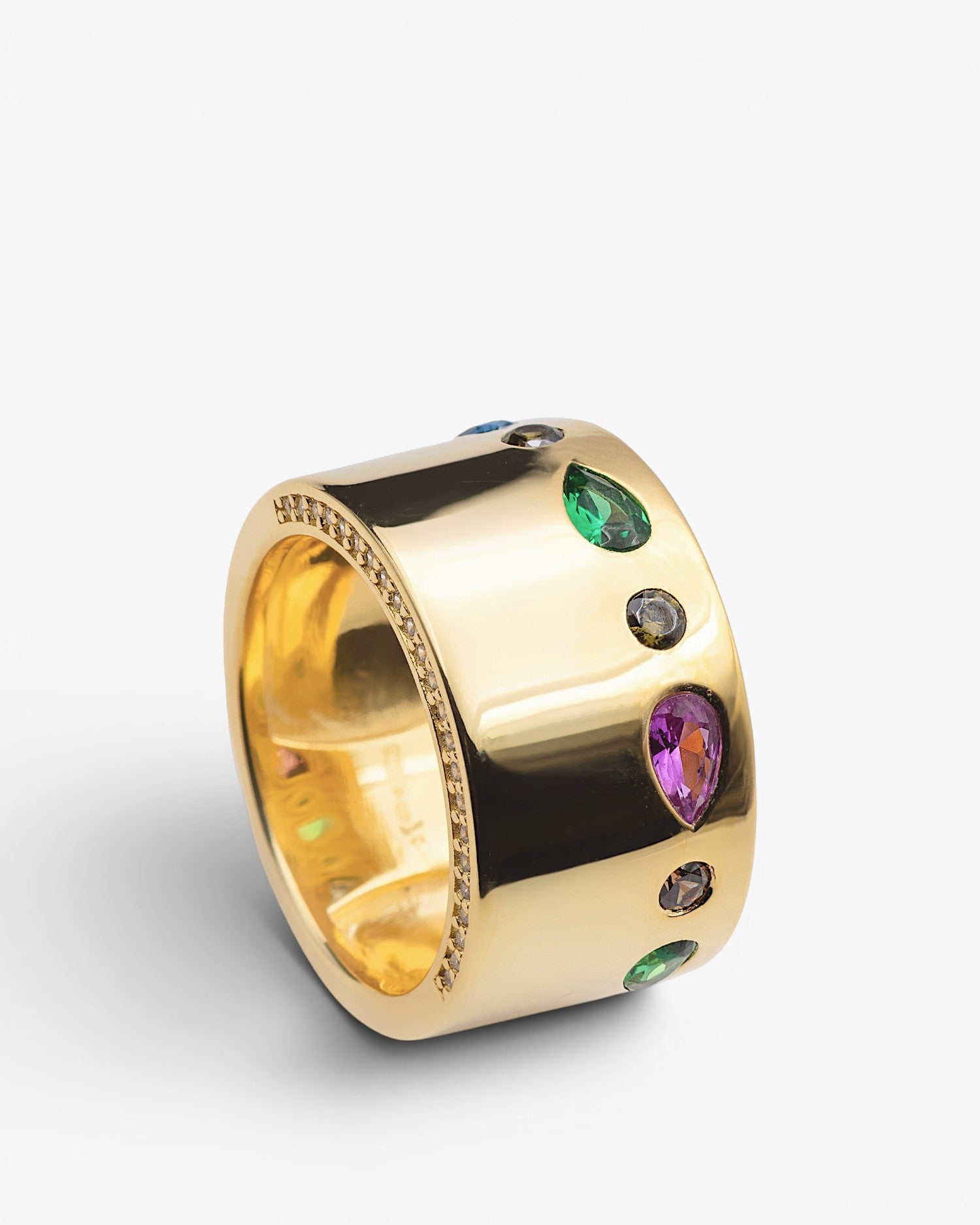 Anillo ancho de plata dorada con circonitas multicolor