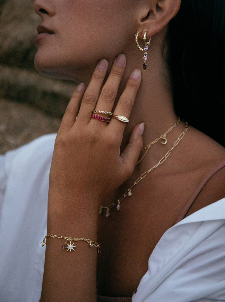 Gilded 925 sterling silver North Star bracelet with lilac stone charms and a blue detail