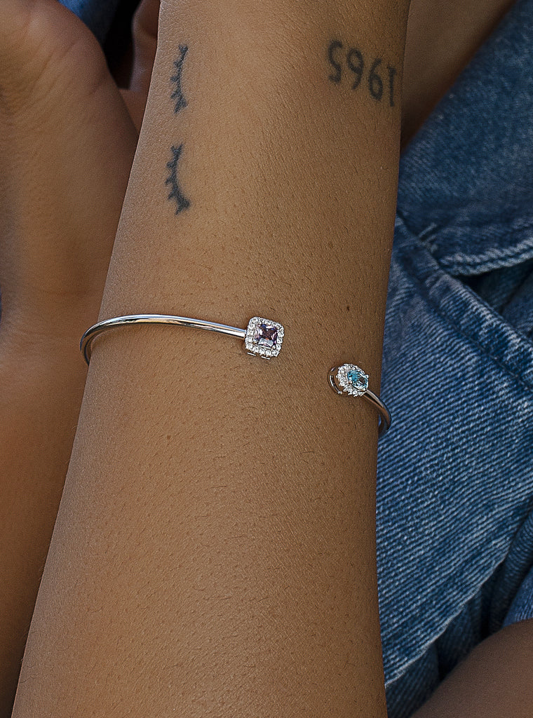 Pulsera rígida de plata con circonitas lila y azul