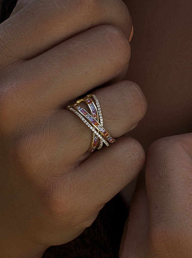 Gold-plated silver crossover ring with multi-colored stones