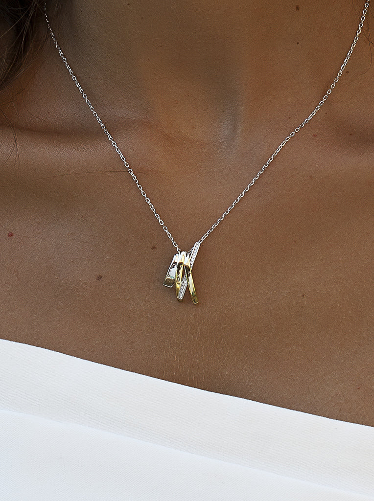 Two-tone silver necklace with original design cubic zirconia.