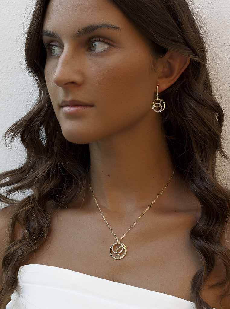 Pendientes colgantes bicolor de plata con circonitas diseño circulares