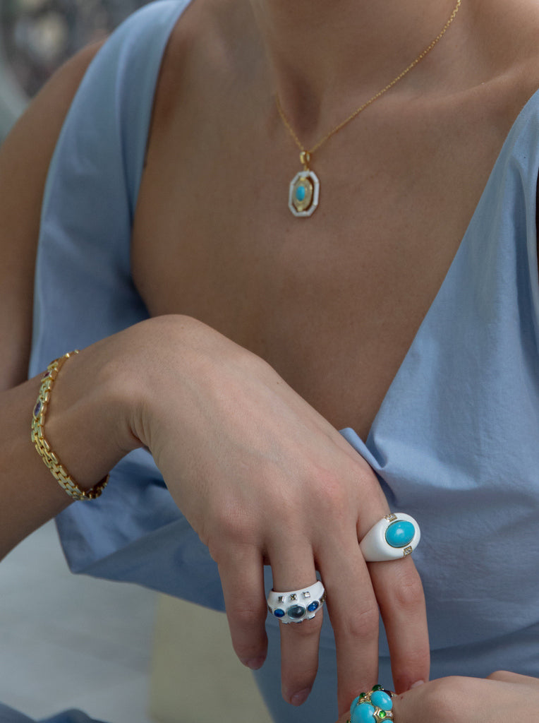 Anillo de plata esmalte blanco con piedra turquesa
