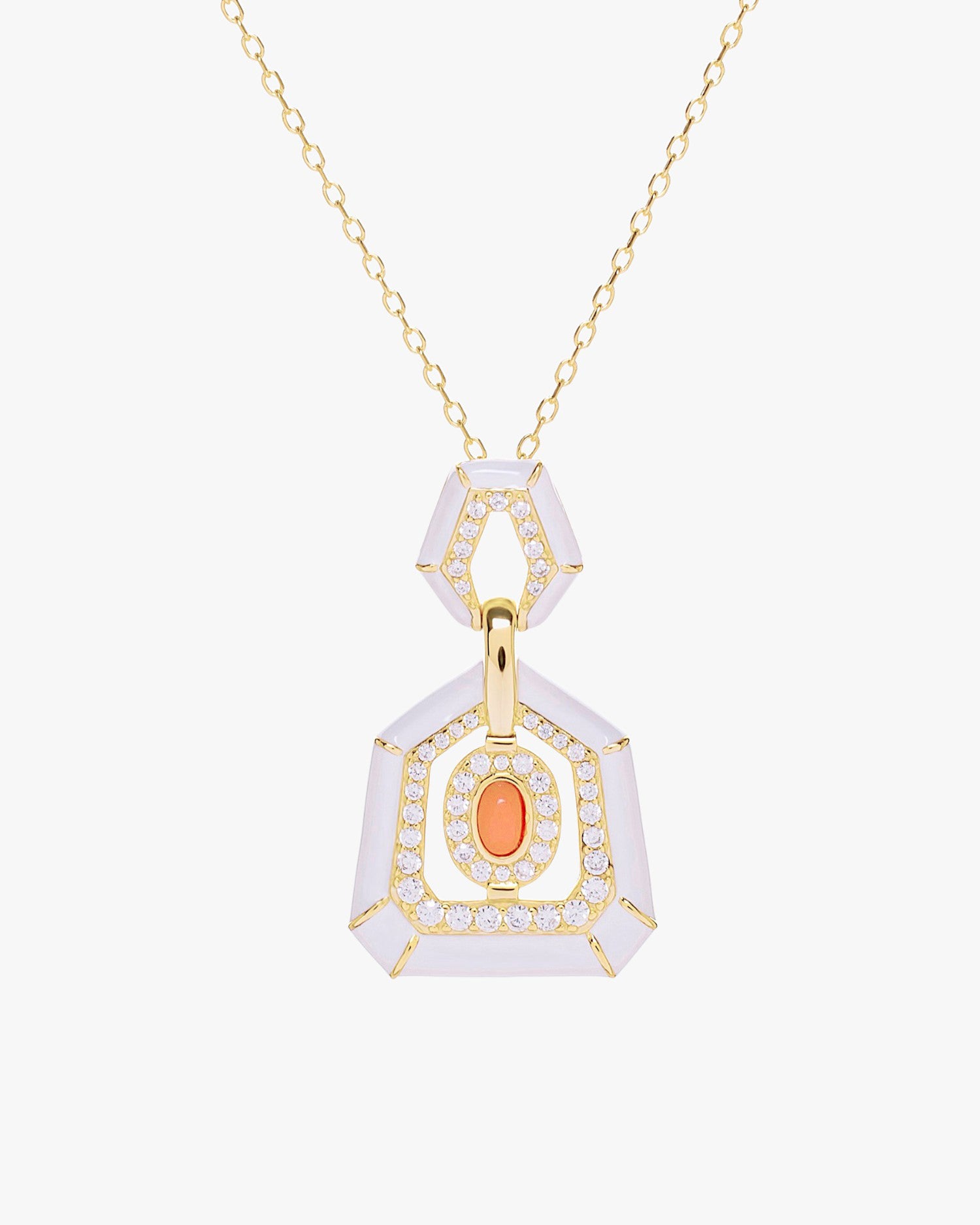 Colgante de plata bañada en oro con esmalte blanco y piedra coral