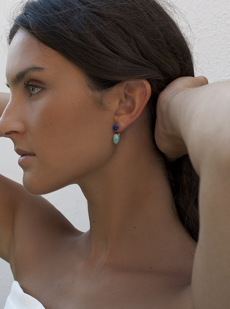 Rose gold-tone silver earrings with blue stones