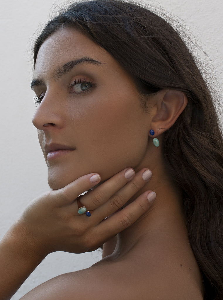 Rose gold-tone silver earrings with blue stones