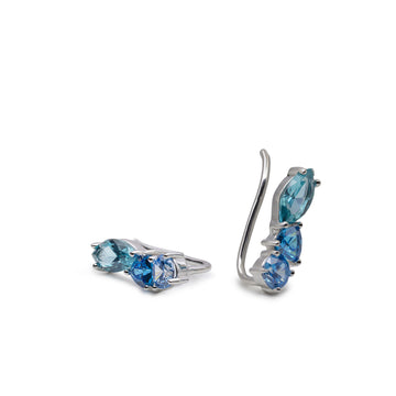 Pendientes trepadores de plata y piedras azules
