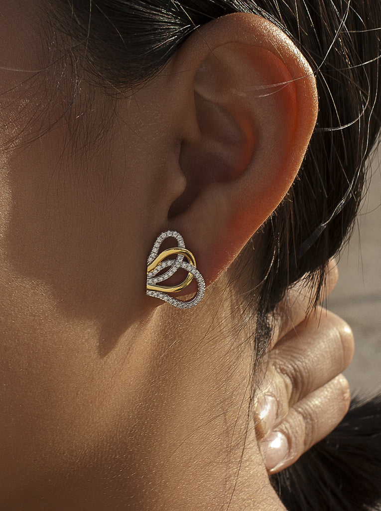 Pendientes de plata bicolor con circonitas diseño entrelazado