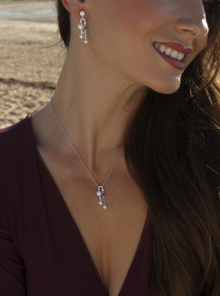 Colgante de plata con perlas y piedras fucsia y lila