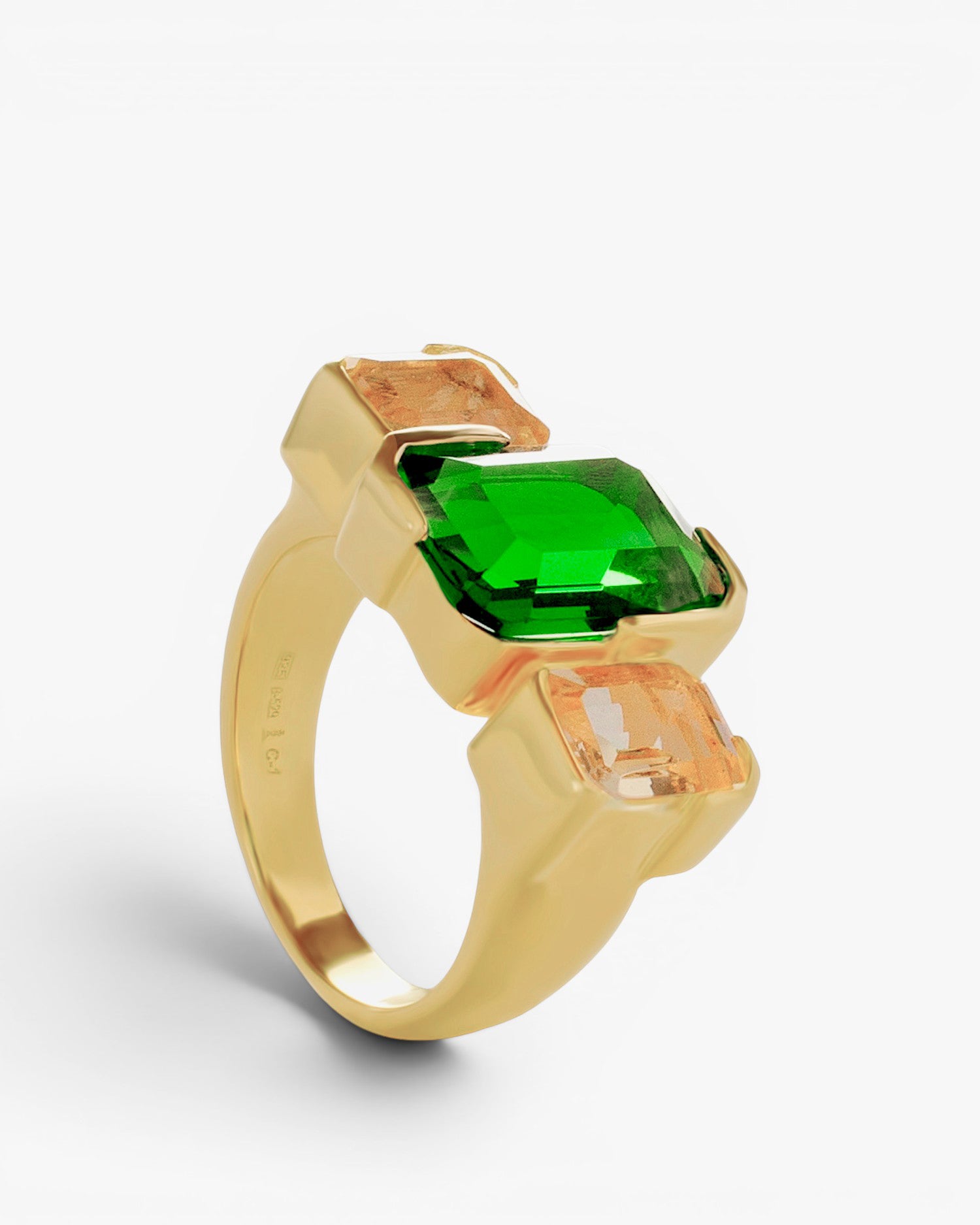 Anillo de plata bañado en oro con piedras verde esmeralda y champagne