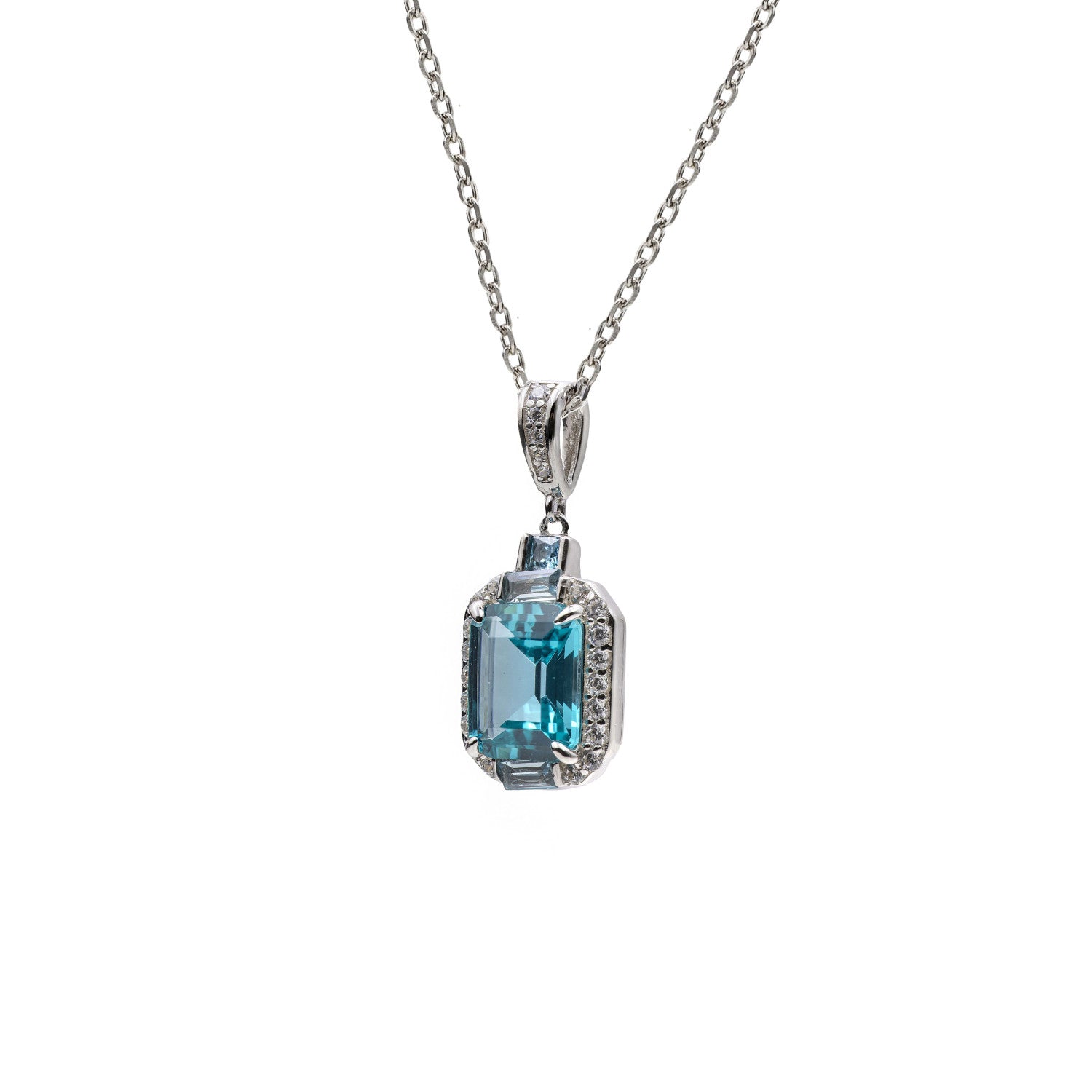 Colgante de plata con piedra turquesa y detalles azul claro