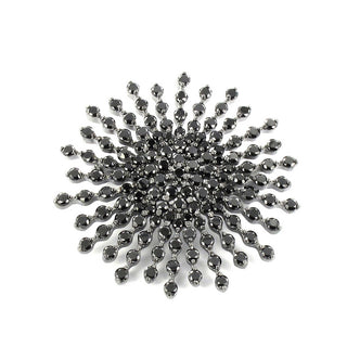 Broche de plata en rodiom negro con diseño de estrella con circonitas