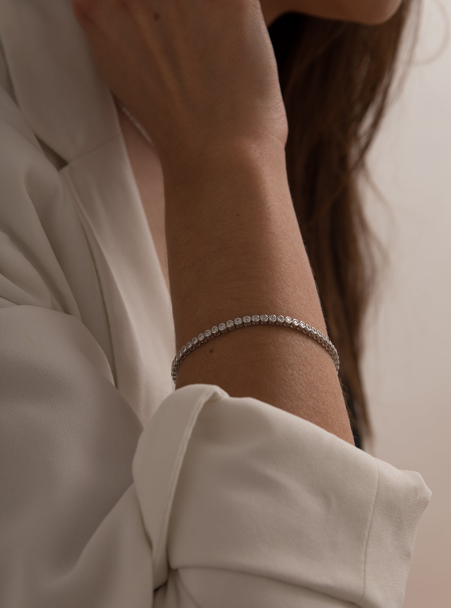 Pulsera riviere de plata motivo circular de circonita blanca