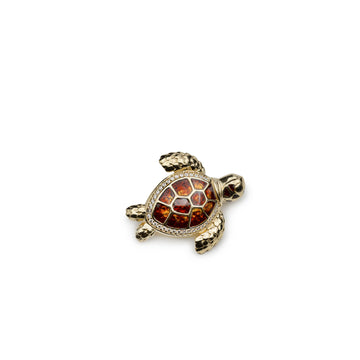 Broche con circonitas y esmalte en forma de tortuga