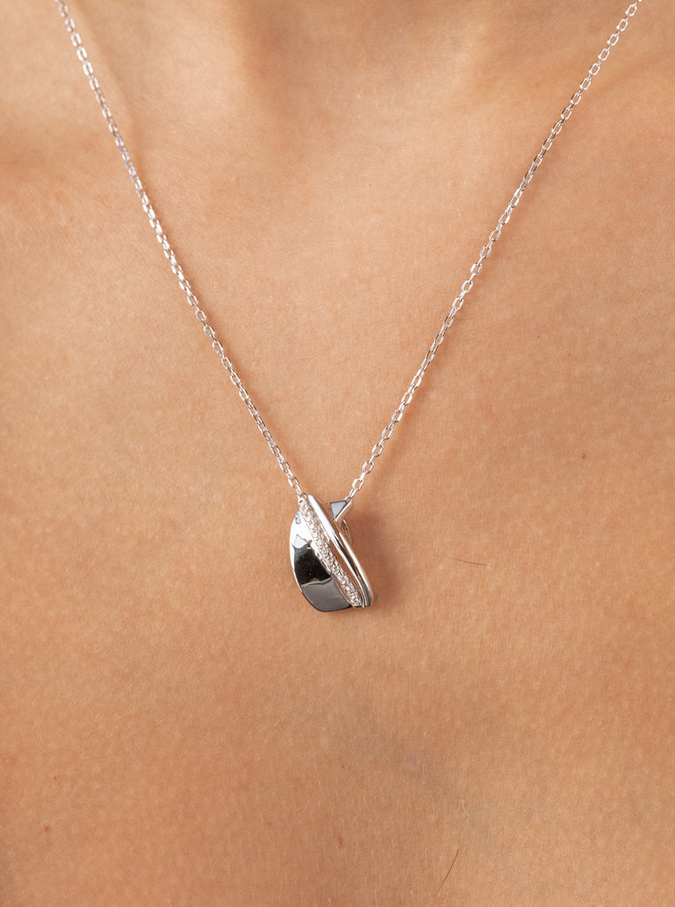 pendant silver with zirconias pendant crossed.