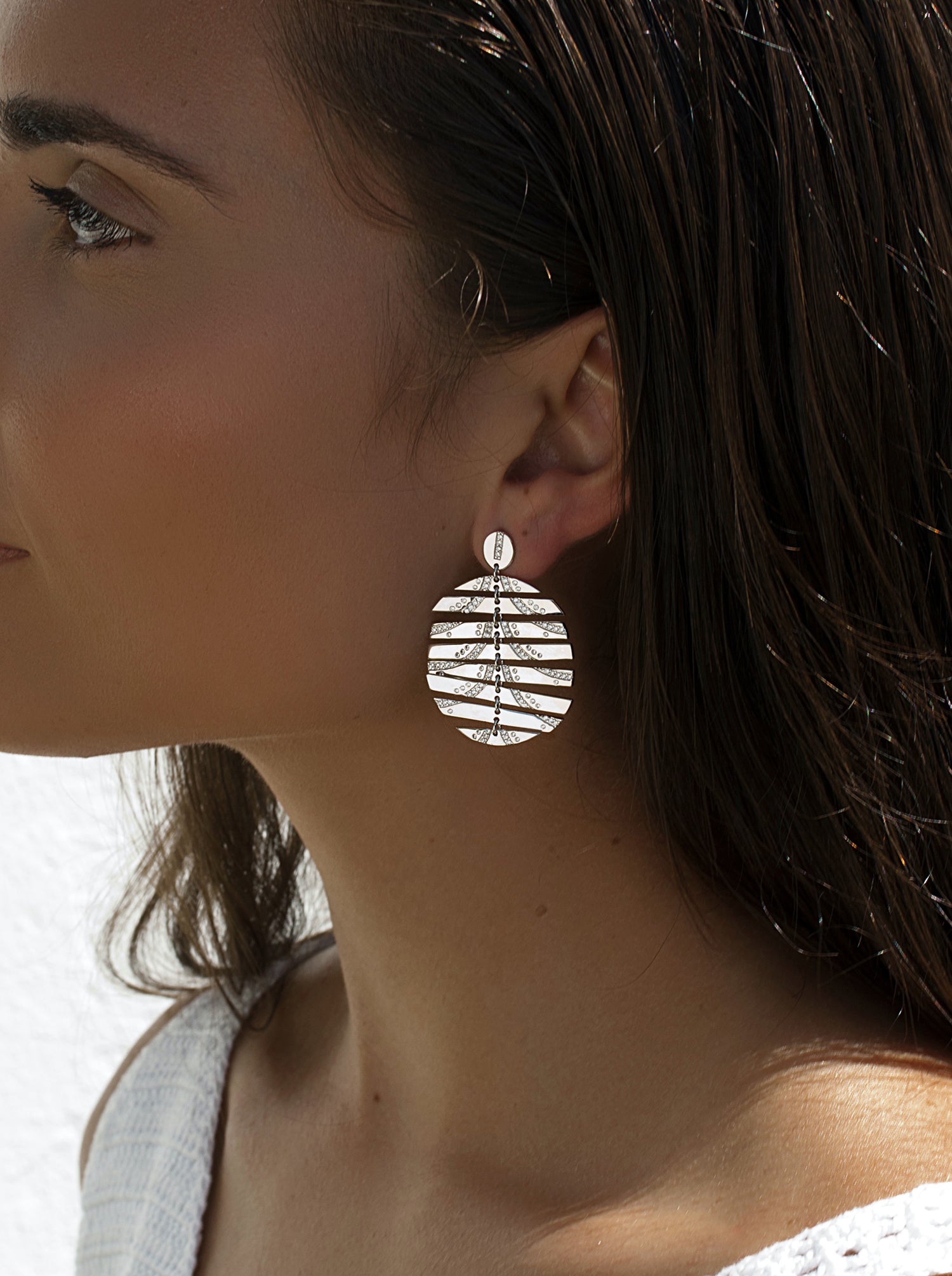 Pendientes circulares con diseño circular movible con circonitas