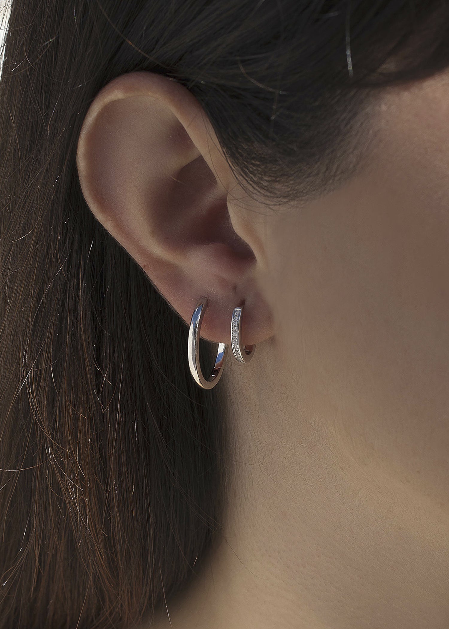 Mini silver hoop earrings with cubic zirconia